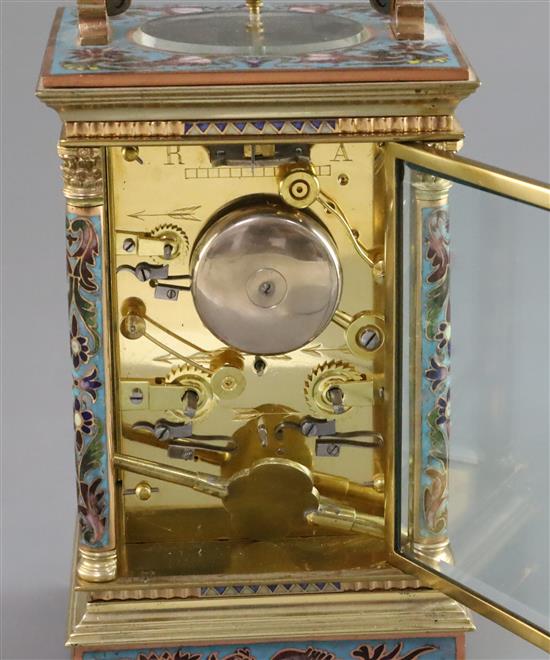 An early 20th century French ormolu and champleve enamel hour repeating carriage alarum clock, height 7.5in.